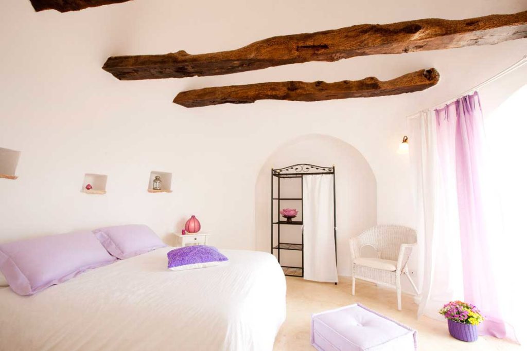 Interior view of the bedroom at Rosa dei 4 Venti in Puglia, Italy