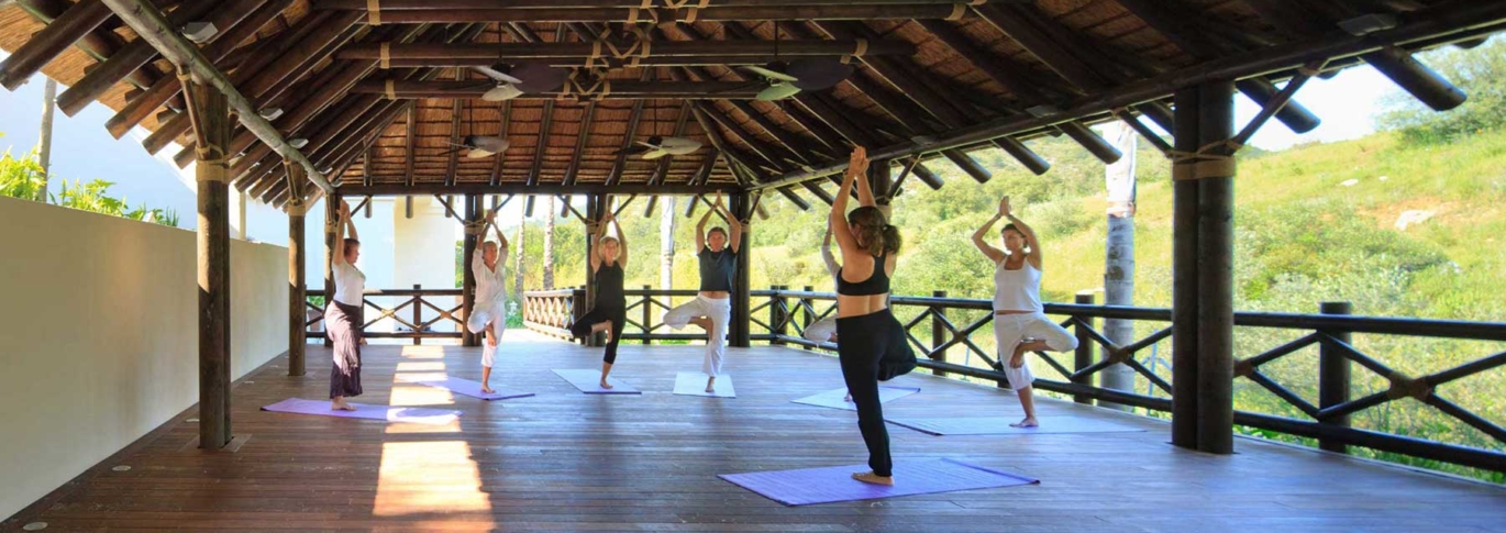 A yoga class in progress in the pavillion at Shanti Som