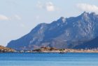 Seaview with tower and mountains from Galanias, Sardinia